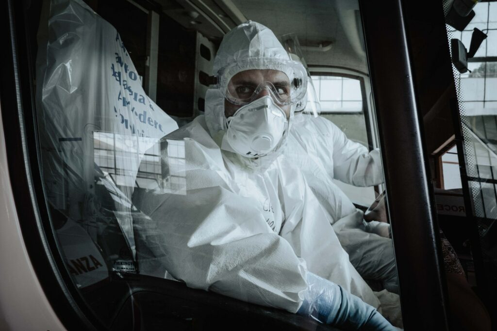 man in white dress shirt wearing white face mask