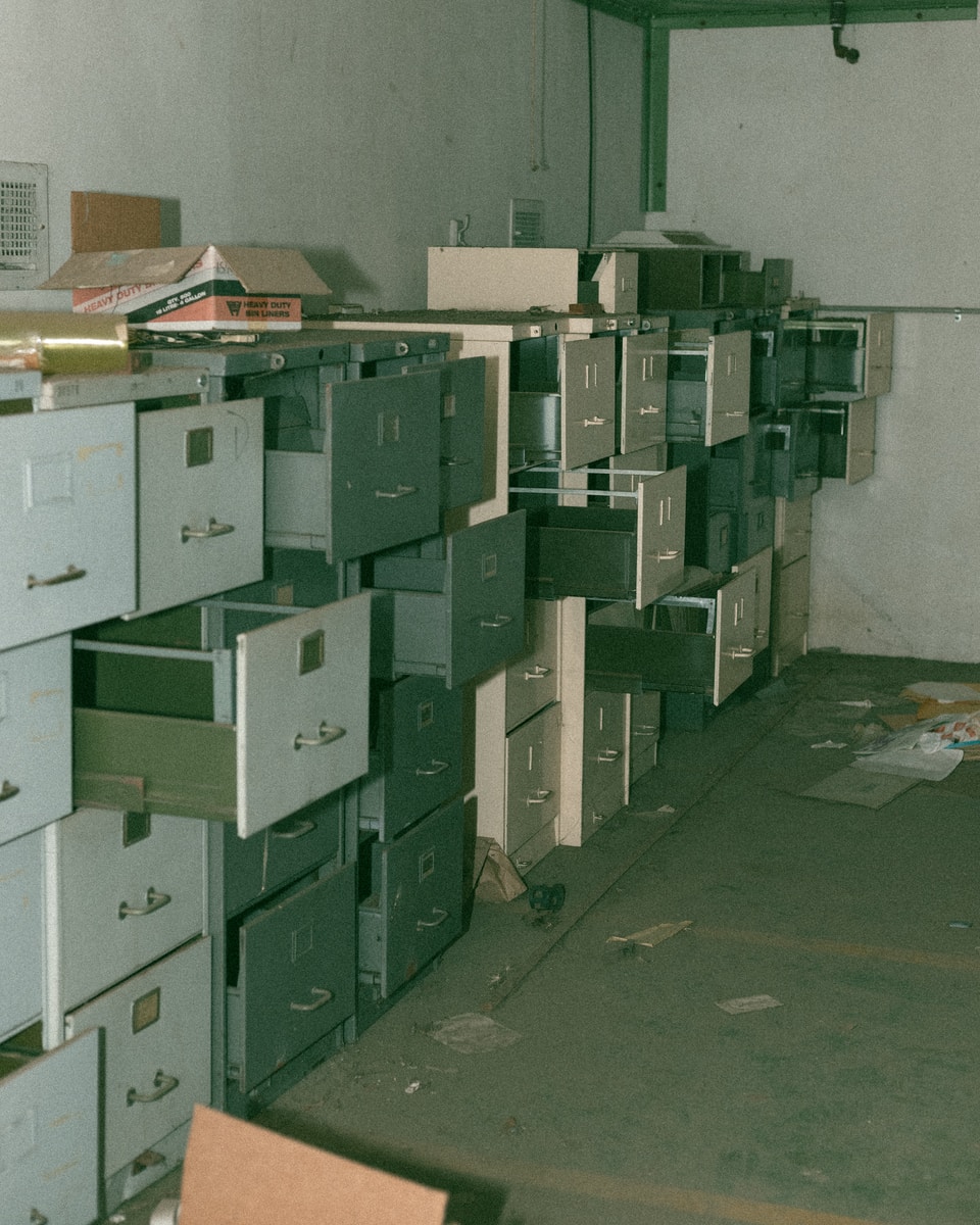 green and white cardboard boxes