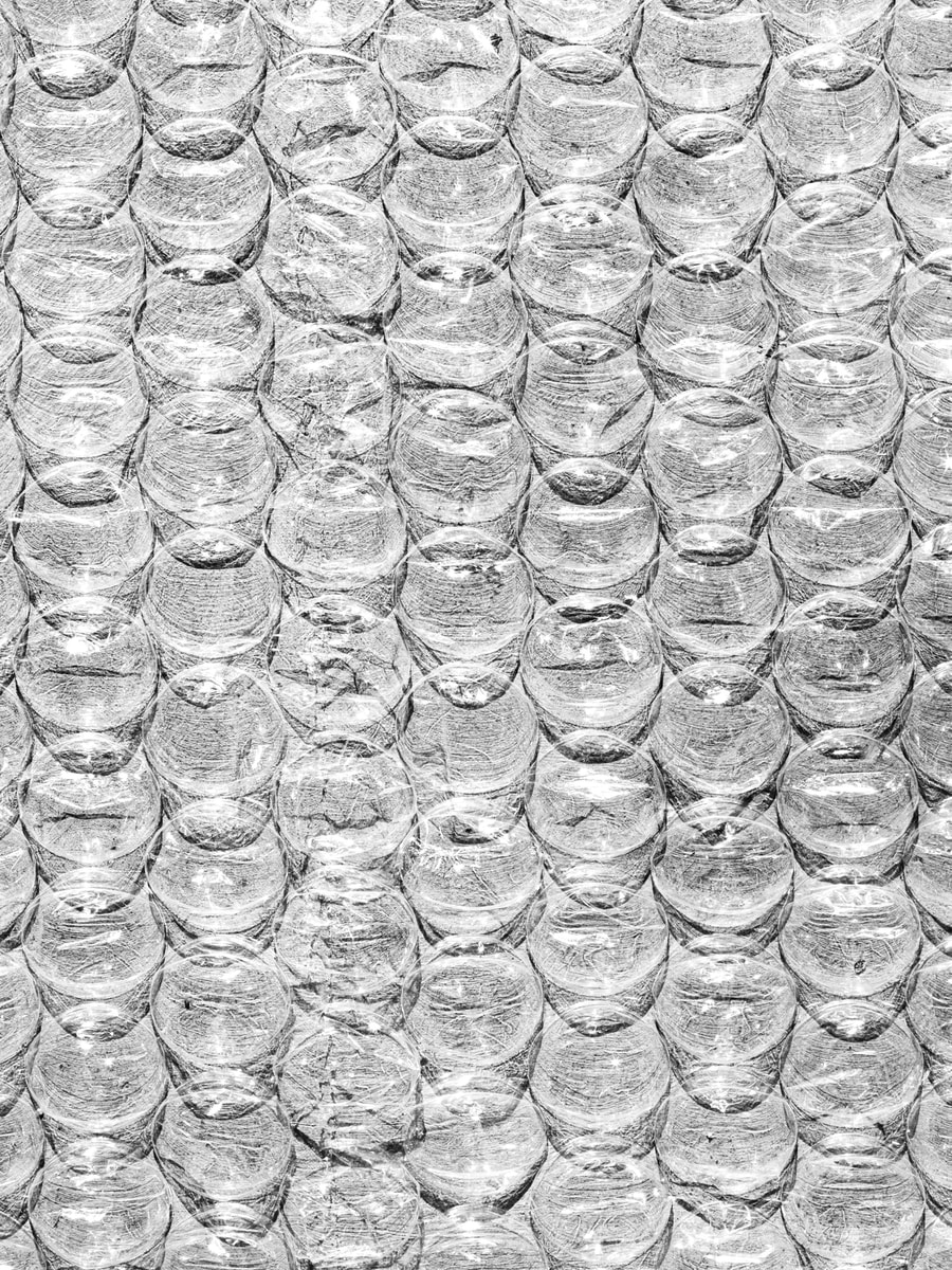 grayscale photo of water droplets on glass