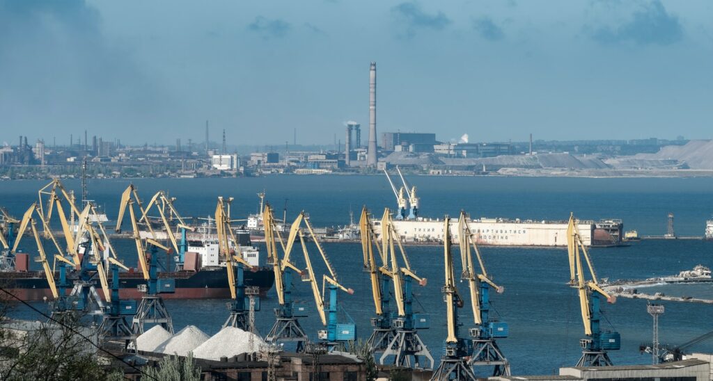 white and blue ship on sea during daytime