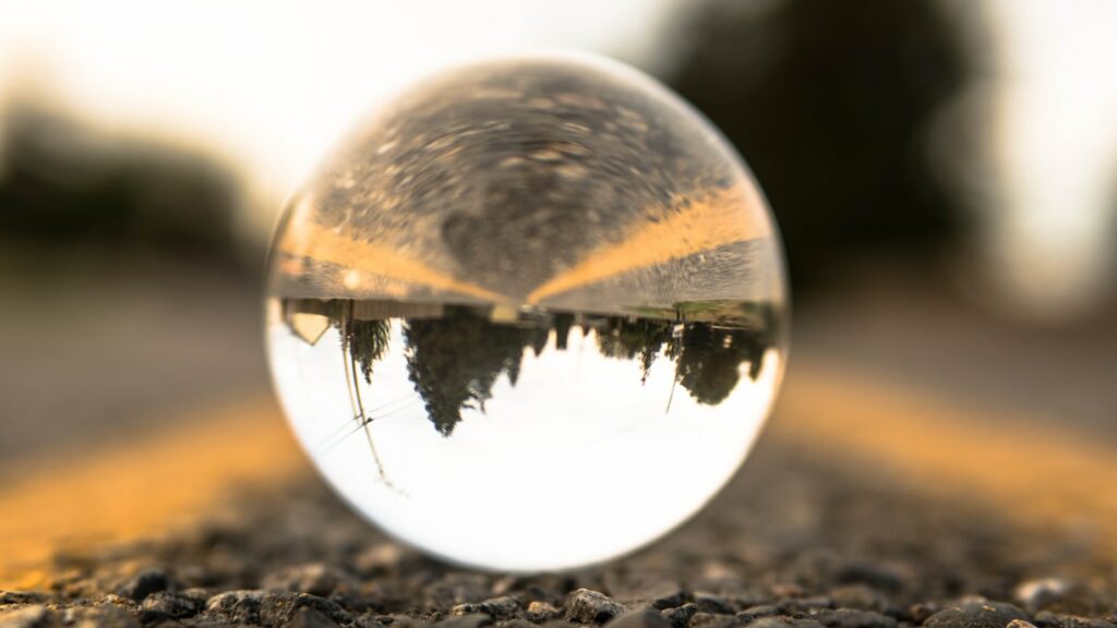 clear glass ball on ground during daytime