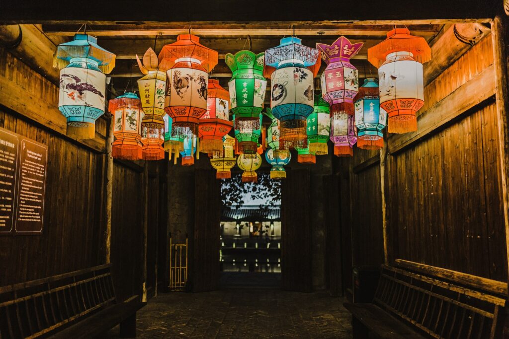 photo of assorted-color Chinese lanterns inside room