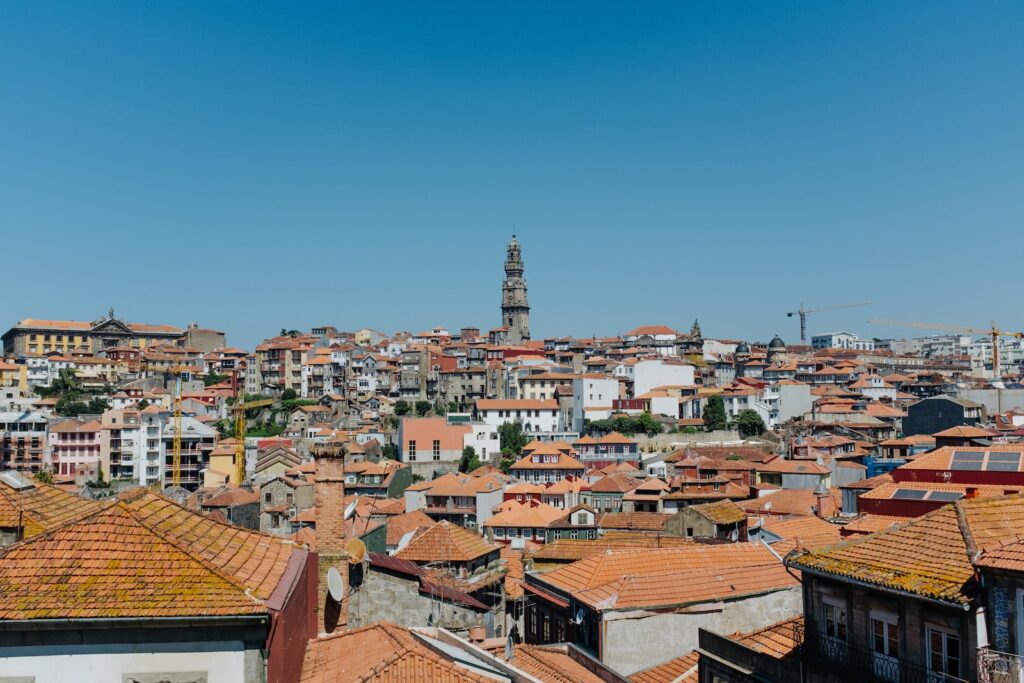 cityscape view of city under blue skies