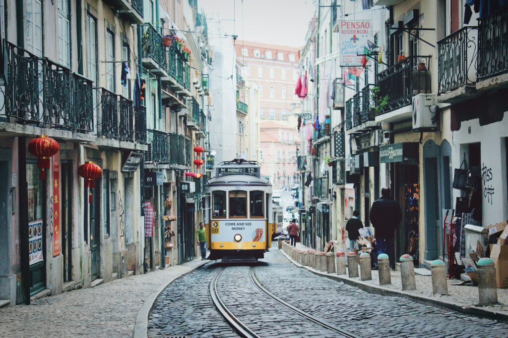 train passing in between buildings