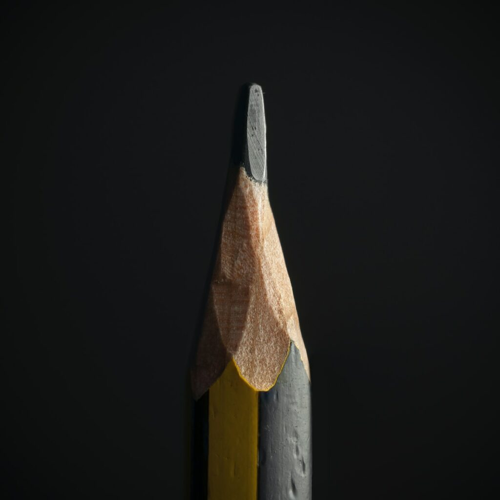 black pencil on black background