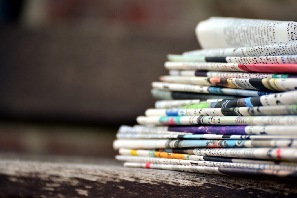 newspapers, pile of newspapers, press