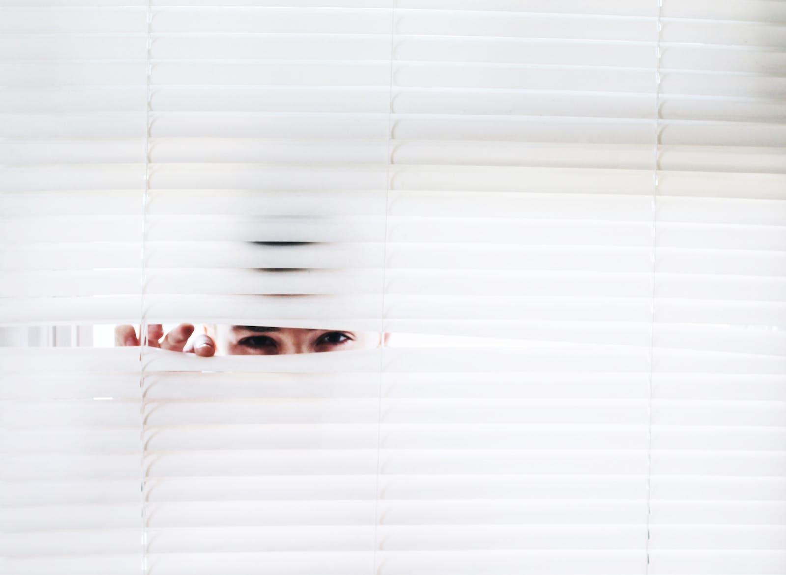 Photography of Person Peeking