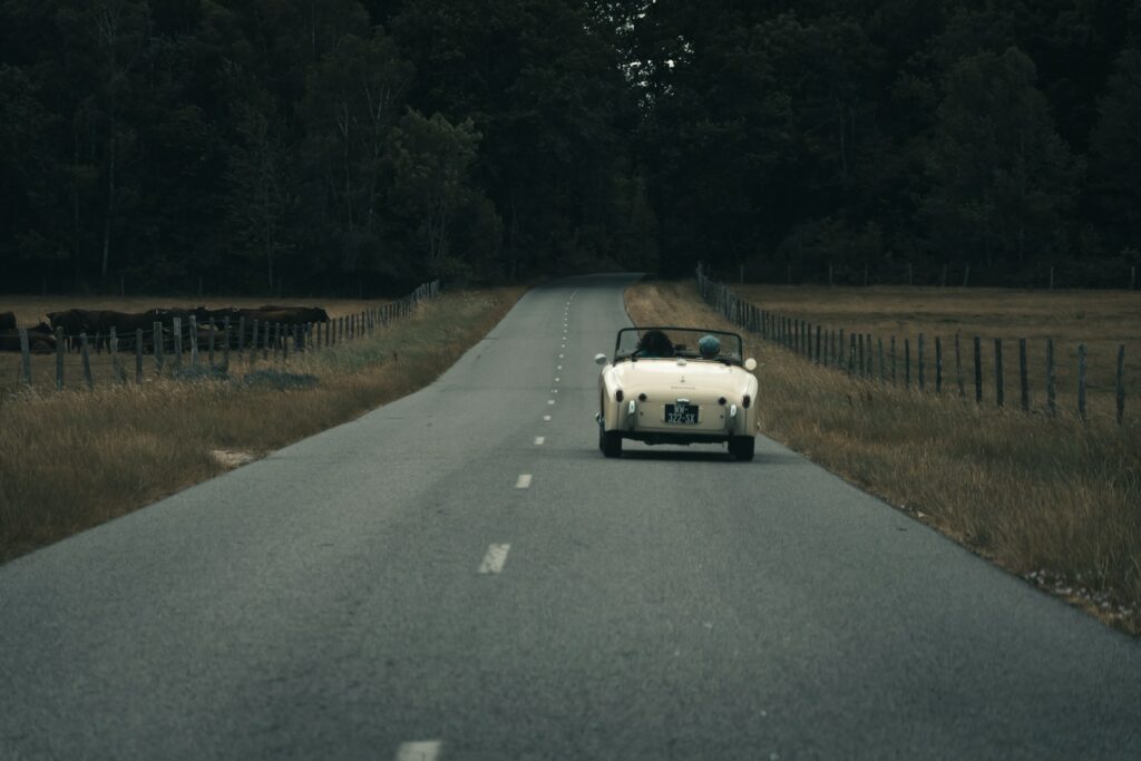 white vehicle on road