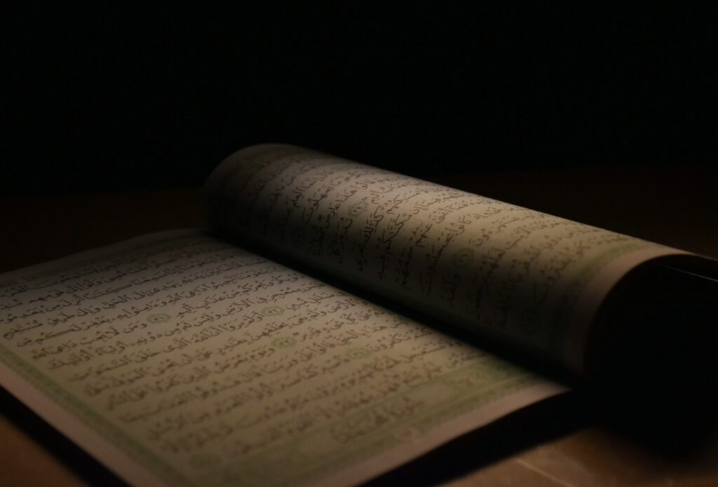 white book page on brown wooden table