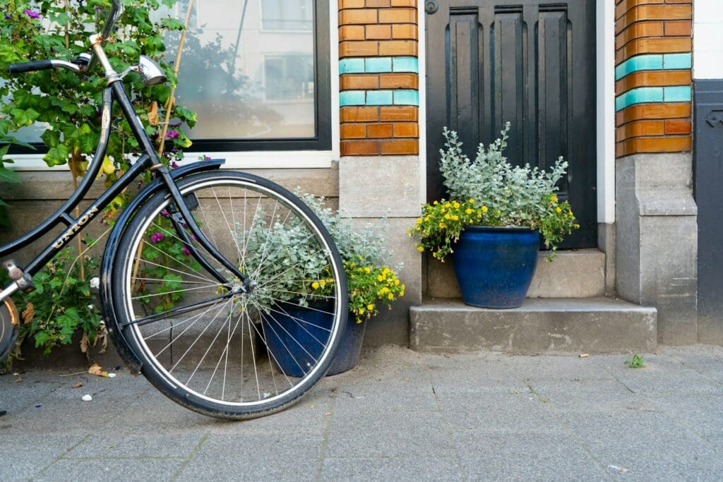 a bicycle parked in front of a house