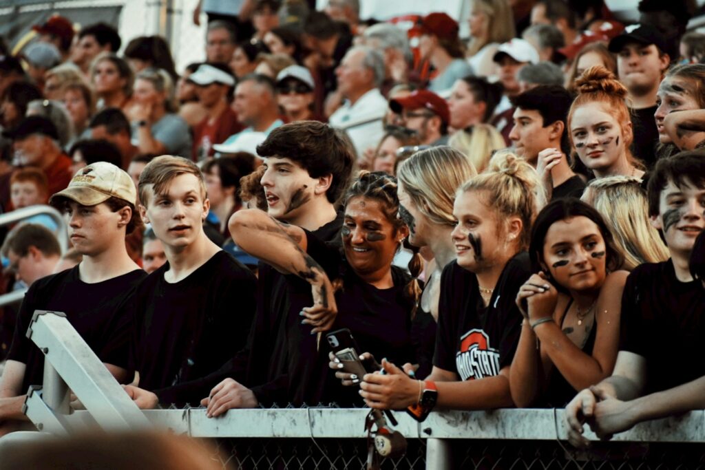 group of people in black shirts